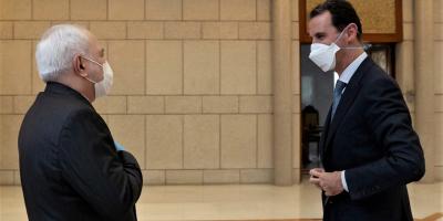 Syrian-President-Bashar-Assad-right-with-Iranian-Foreign-Minister-Mohammad-Javad-Zarif-in-Damascus-Syria-April.-20-2020.-Syria-News-Agency-via-AP-1280x640.jpg