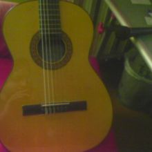 Guitarra y micro pegado con celo